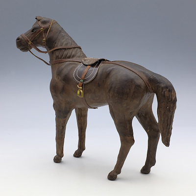 WOOD AND LEATHER HORSE STATUE-Wooden carving with leather covering