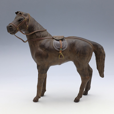 WOOD AND LEATHER HORSE STATUE-Wooden carving with leather covering