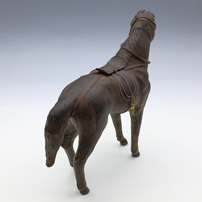 WOOD AND LEATHER HORSE STATUE-Wooden carving with leather covering